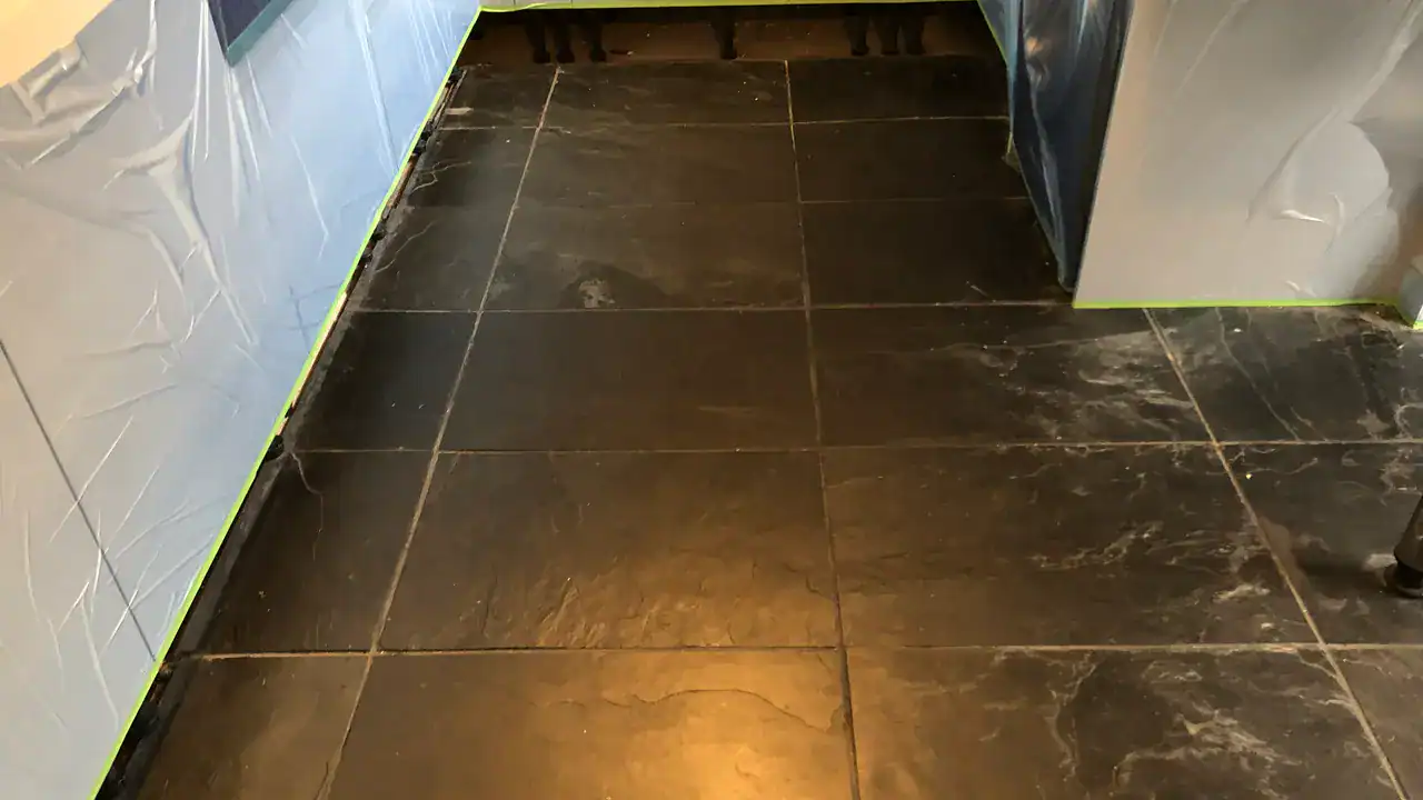 Grout spots on textured kitchen slate tiles