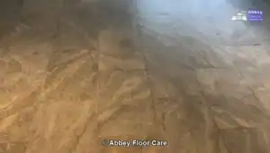 Tumbled Travertine floor in need of Restoration by Abbey Floor Care