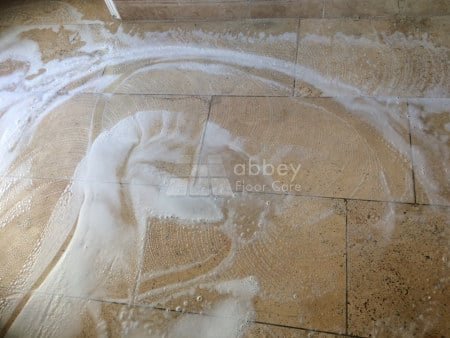Applying Travertine Cleaner to soiled Travertine floor in Selby North Yorkshire