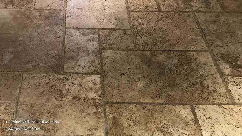 Travertine with soil filled holes