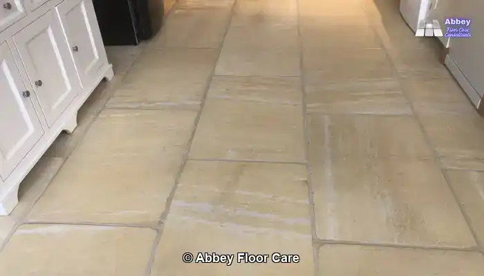 Warm-toned limestone tiles with subtle natural variation in a UK kitchen