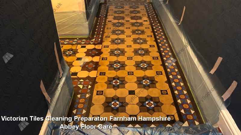 Hallway edges and surrounding surfaces protected during a Victorian tile floor cleaning project in Farnham