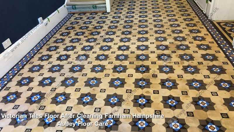 Victorian tiled hallway floor in Farnham after cleaning, looking brighter with the pattern clearer