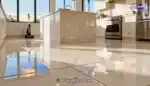 A bright, modern UK kitchen with seamless porcelain tile floor, natural morning light, vivid reflections, advanced cleaning tools in background, realism, depth, durable tiles.