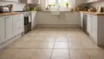 Dull ceramic floor with dark grout in a kitchen