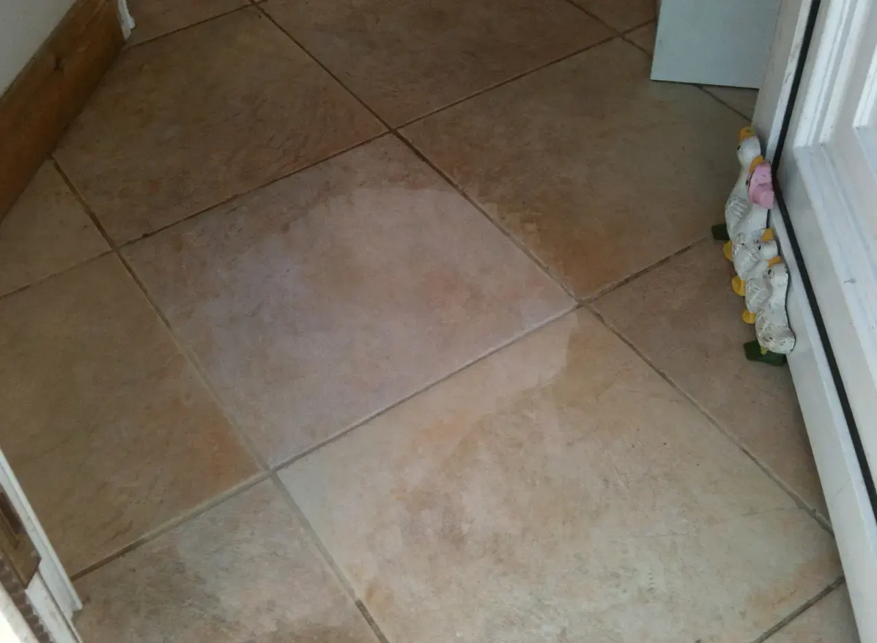 Ceramic tile test area before and after cleaning
