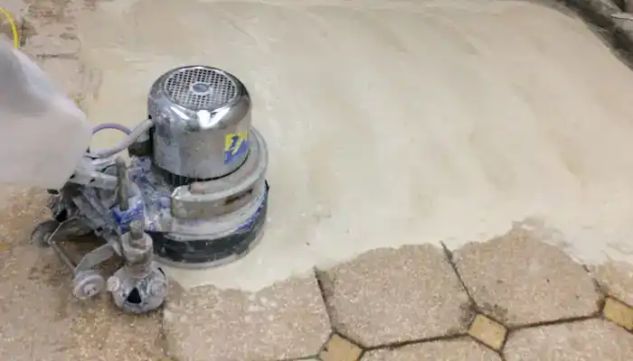 Diamond grinding stage during professional terrazzo polishing to refine the surface