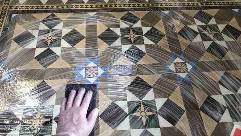 hand scrubbing victorian tiles