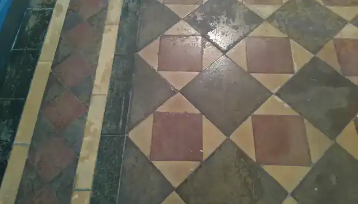 Close-up of worn surface on historic Minton clay tiles