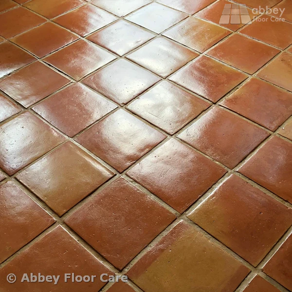enjoy a stunning terracotta tile floor