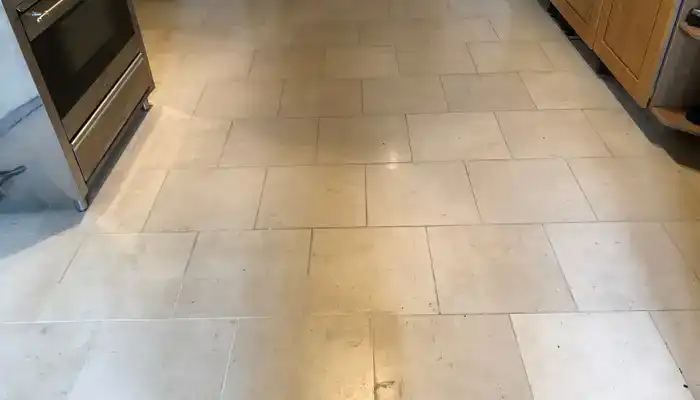 Dull and uneven areas developing on a limestone floor over time