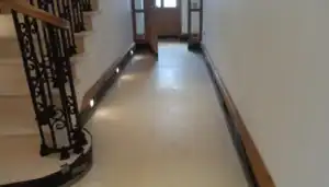 Limestone floor in a UK home showing natural variation and an even honed surface