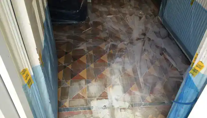 Minton tile floor during cleaning and residue removal in Tutbury