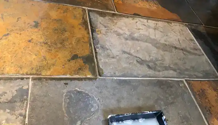 Comparison of slate surfaces showing how sealing affects colour and appearance.