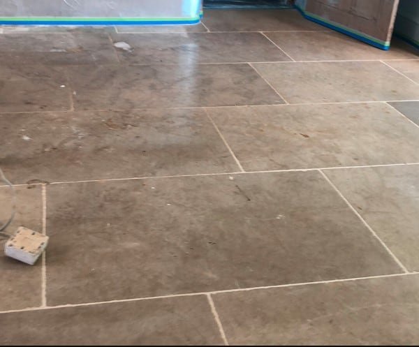 image of a soiled and damaged limestone floor in coleorton leicestershire