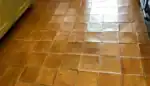 Terracotta floor tiles in a UK home showing natural colour and texture after proper cleaning and sealing
