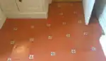 Terracotta floor after cleaning, sealing and waxing in a Brighton home
