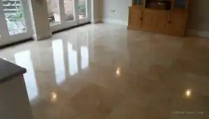 Restored honed travertine floor in a Chippenham home after cleaning, repair, and sealing
