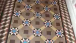 Restored Victorian clay geometric tile hallway floor in Blyth Northumberland