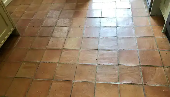 Uneven colour, dull areas and powdery patches can be signs the finish has failed or the tiles are worn rather than simply dirty.